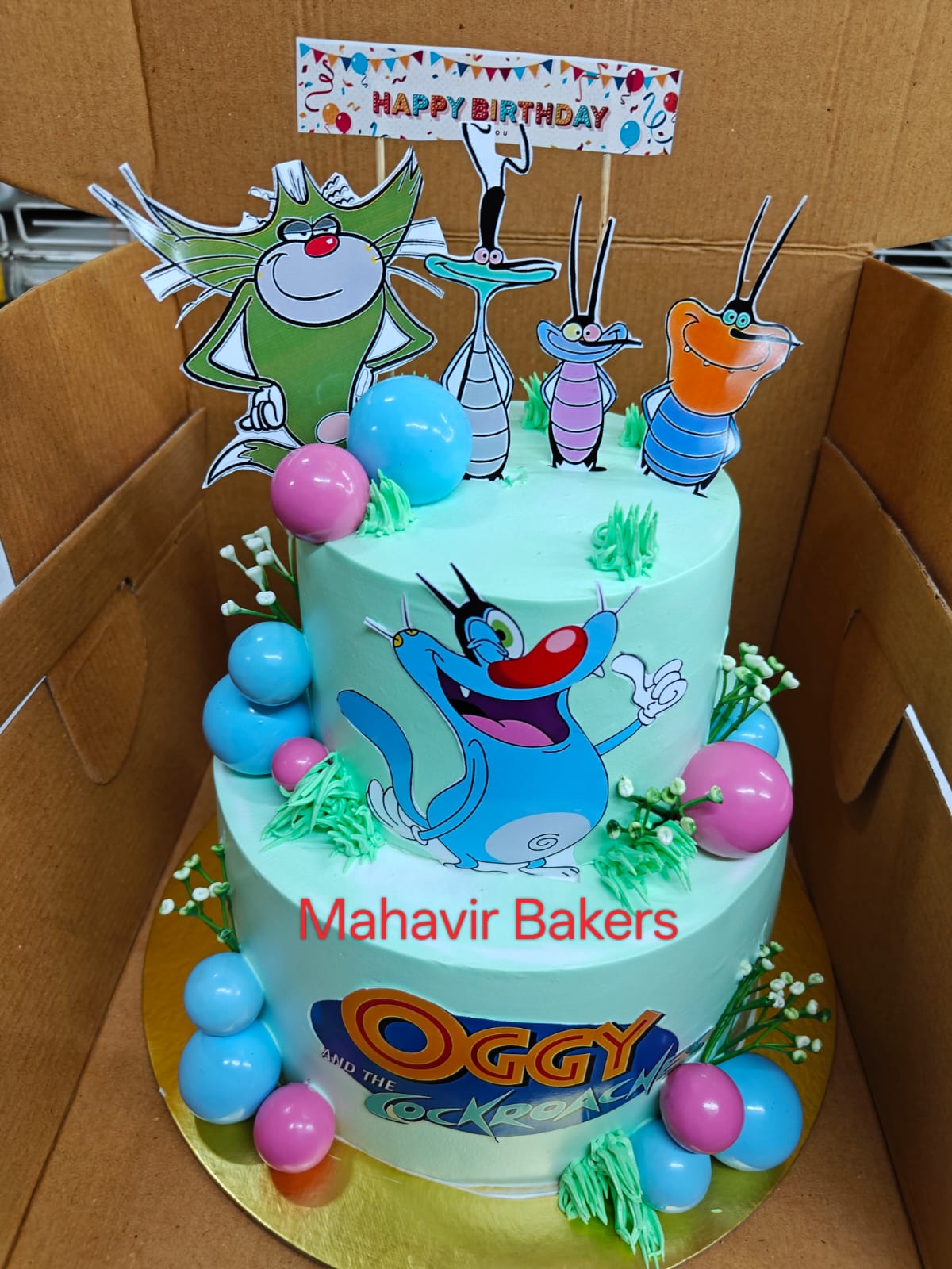 Oggy theme cake